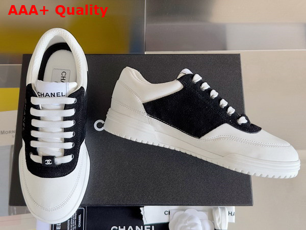 Chanel Sneaker in White Calf Leather and Black Suede Leather Replica