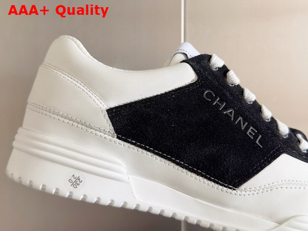 Chanel Sneaker in White Calf Leather and Black Suede Leather Replica